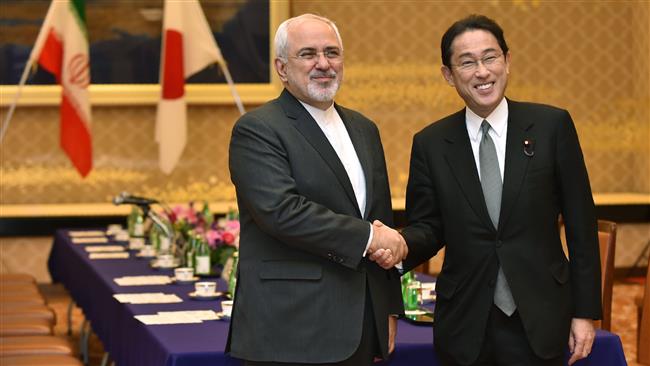 Mohammad Yavad Zarif y Fumio Kishida
