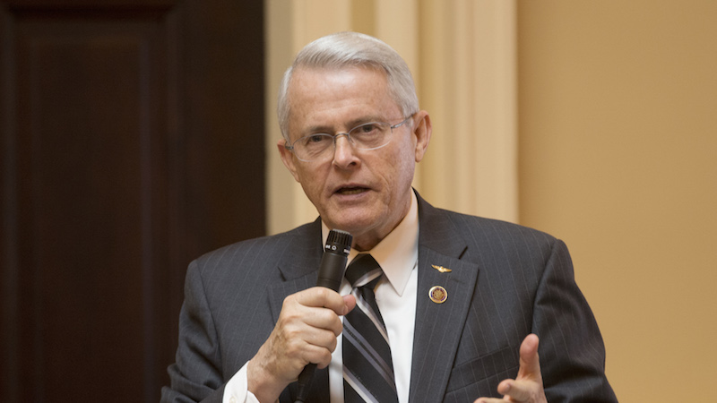 State Sen. Richard Black, R-Loudon, gestures during a debate on the floor of the Senate during the session at the Capitol in Richmond, Va., Tuesday, Feb. 2, 2016. (AP Photo/Steve Helber)