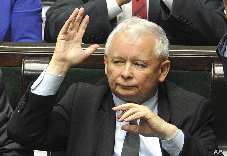 Leader of the ruling Law and Justice party, Jaroslaw Kaczynski votes to approve a law on court control, in the parliament in Warsaw, Poland, Thursday, July 20, 2017. The bill on the Supreme Court has drawn condemnation from the European Union and has led to street protests. (AP Photo/Alik Keplicz)