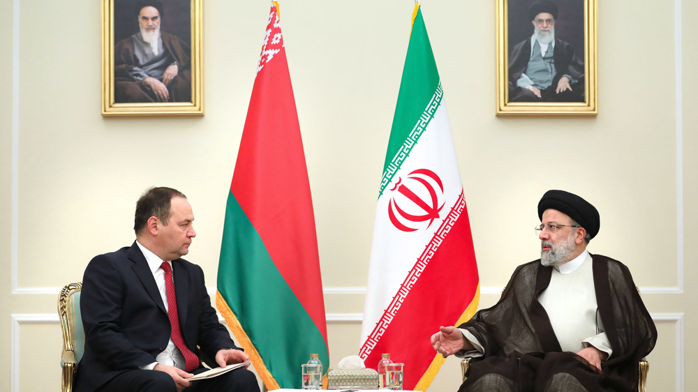 Ebrahim Raisi y Roman Golovchenko